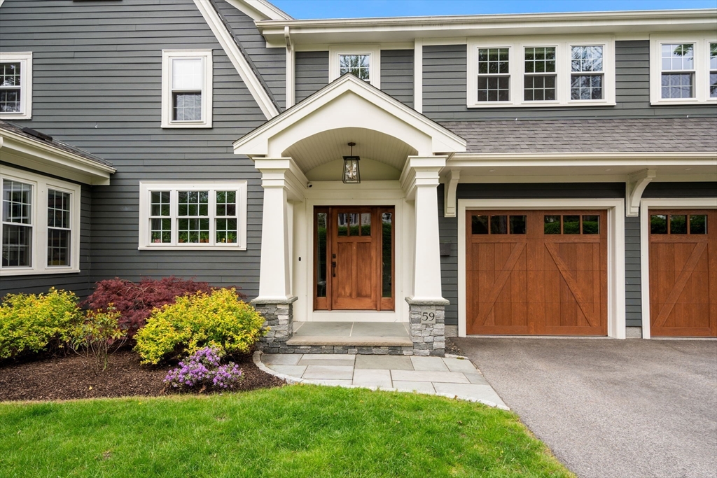 59 Avon Road Wellesley, MA 02482 - Photo 2 of 39 a front view of a house with garden