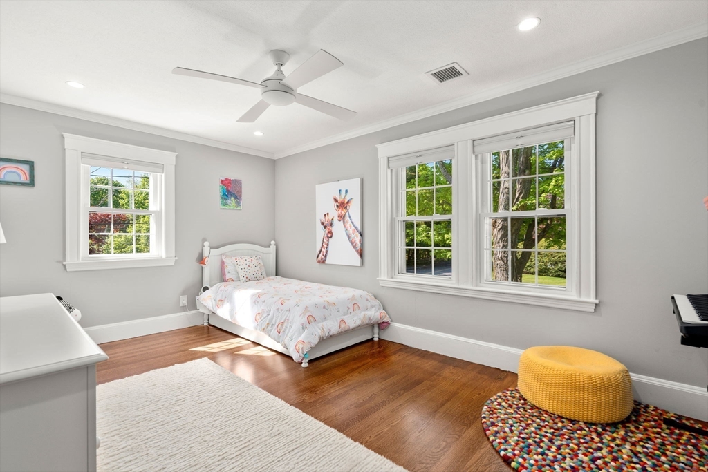 59 Avon Road Wellesley, MA 02482 - Photo 29 of 39 a spacious bedroom with a bed and window