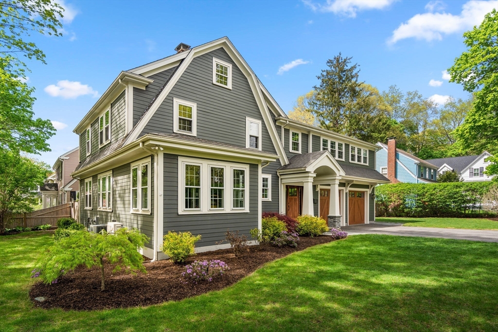 59 Avon Road Wellesley, MA 02482 - Photo 3 of 39 a front view of a house with a yard