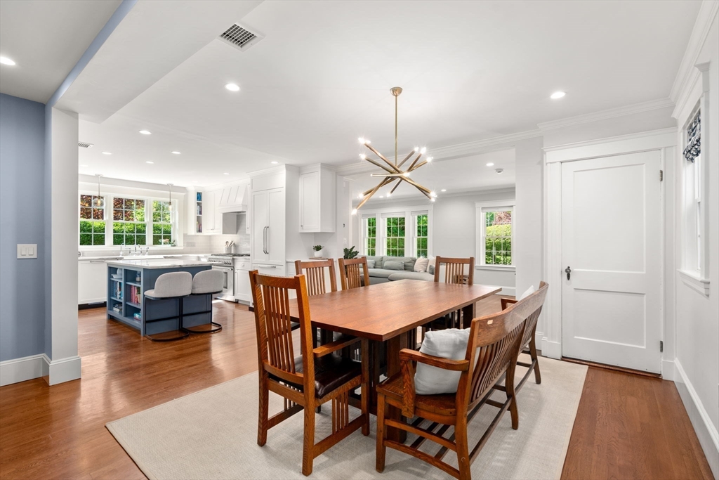 59 Avon Road Wellesley, MA 02482 - Photo 10 of 39 a view of a dining room with furniture and wooden floor