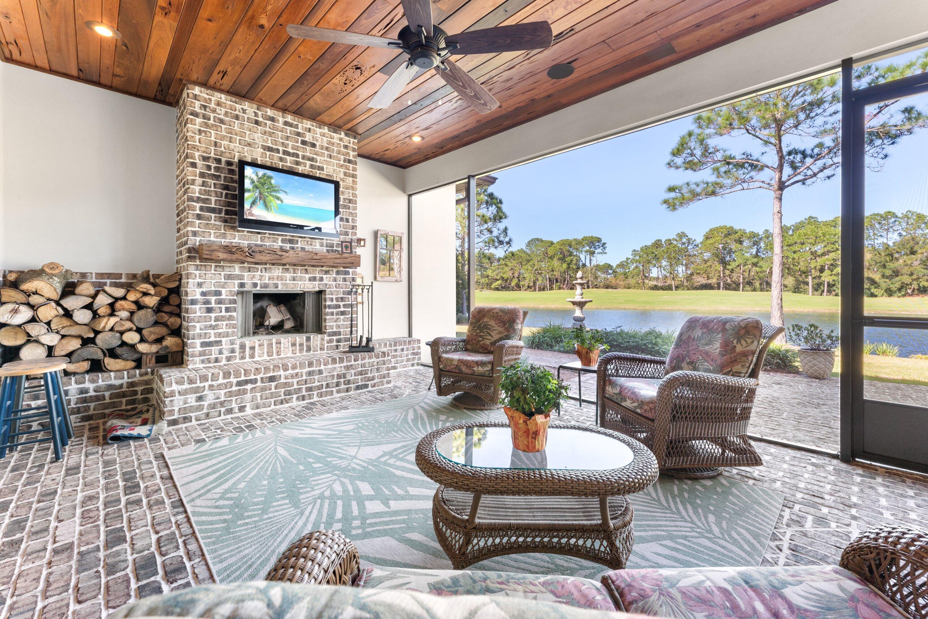 2947 Pine Valley Road Miramar Beach, FL 32550 - Photo 54 of 63 a living room with furniture and a fireplace