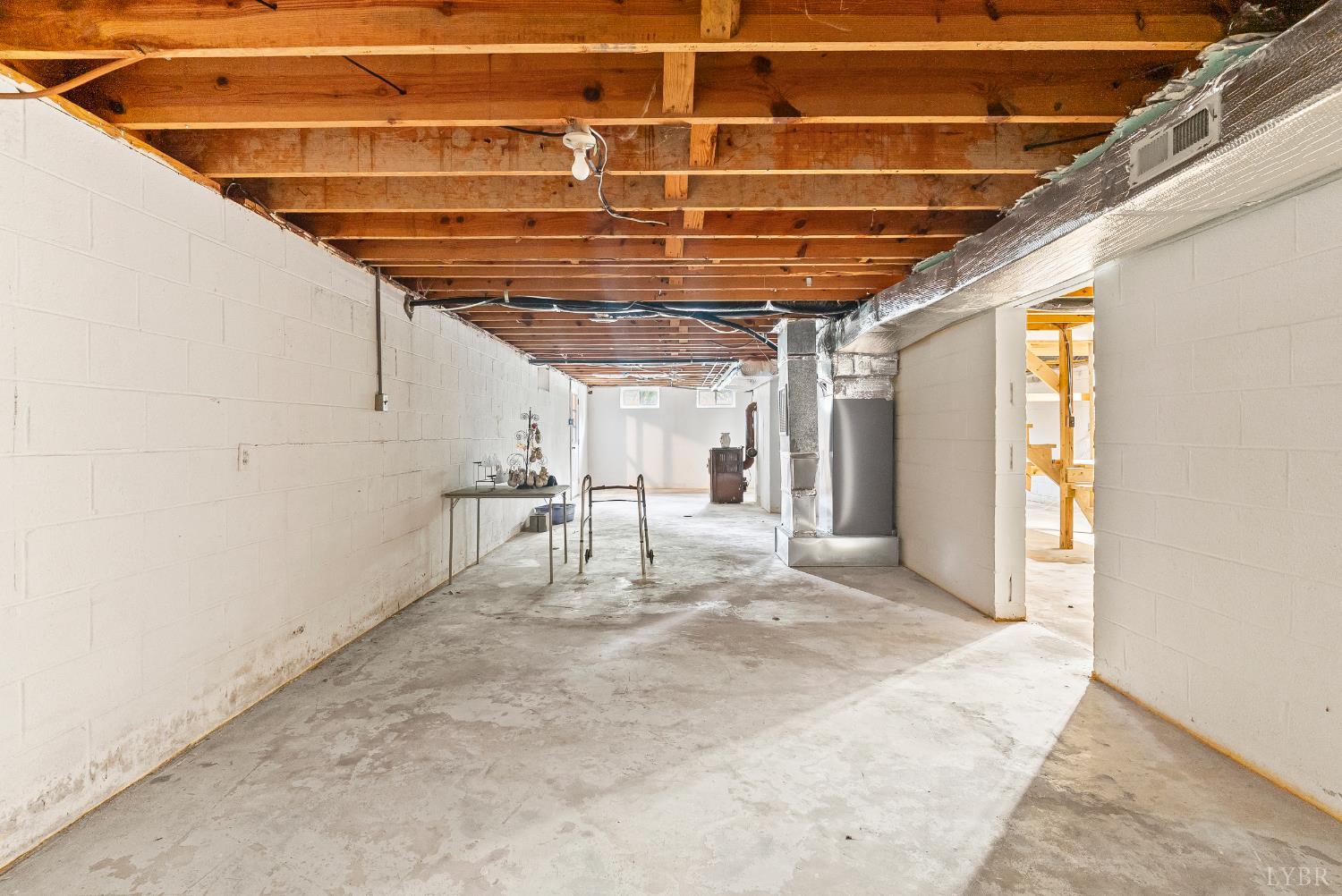 302 Henry Street Gretna, VA 24557 - Photo 26 of 49 a view of a room with wooden walls