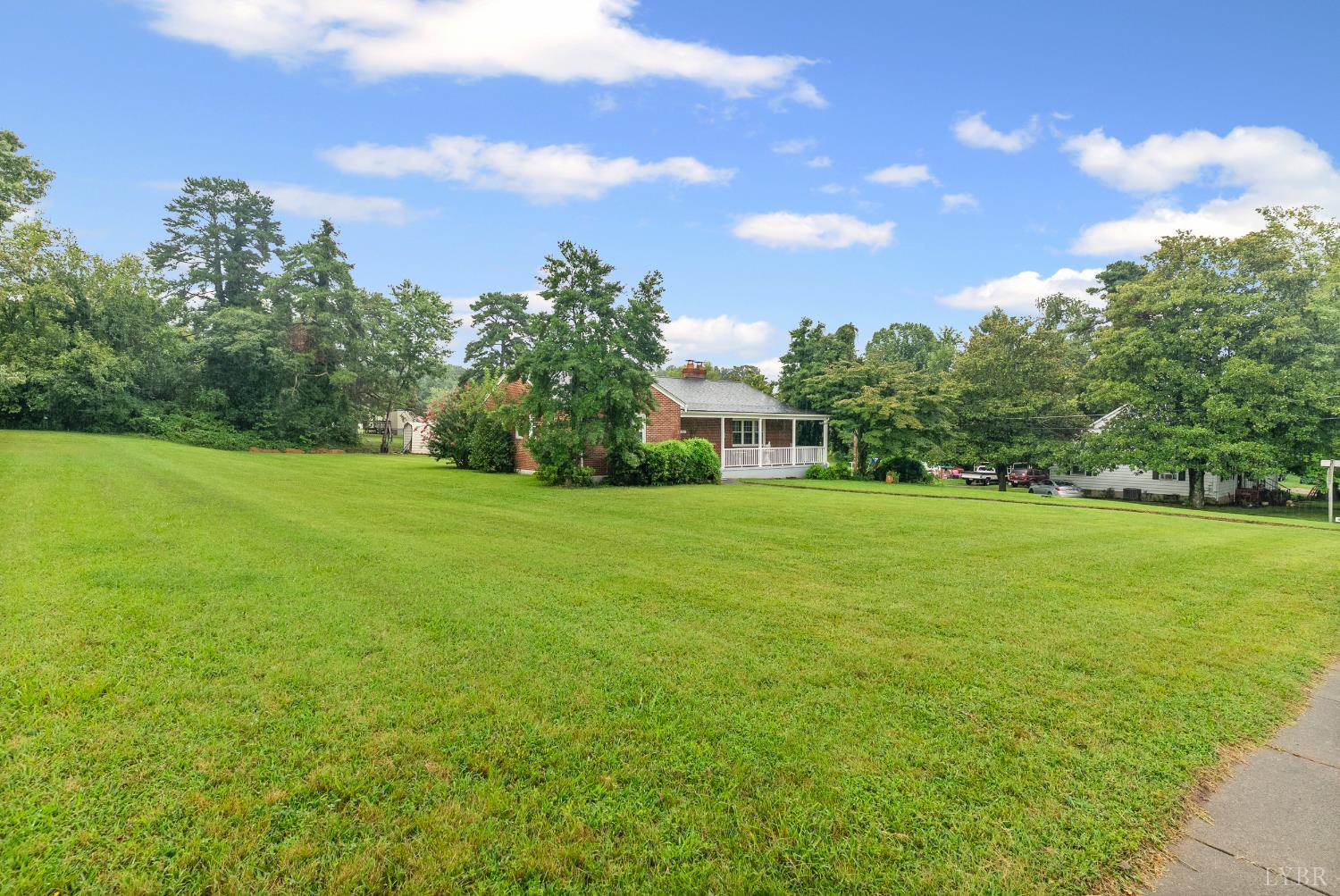 302 Henry Street Gretna, VA 24557 - Photo 31 of 49 a view of a trees with a big yard