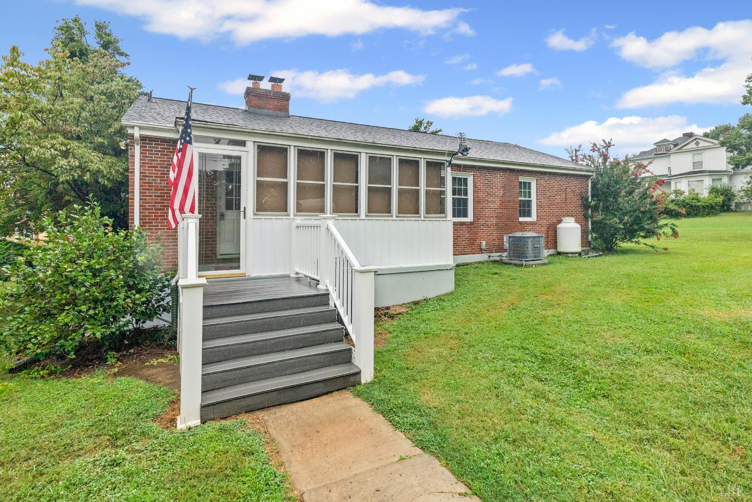 302 Henry Street Gretna, VA 24557 - Photo 39 of 49 a view of a house with backyard and porch
