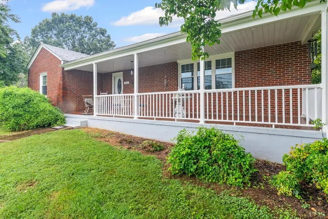 a house view with a garden space