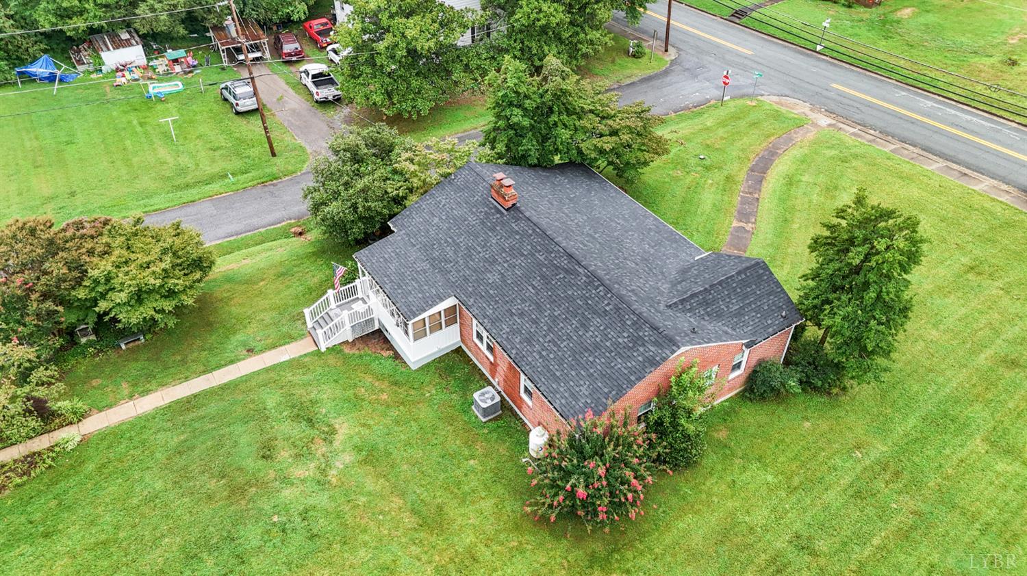 302 Henry Street Gretna, VA 24557 - Photo 42 of 49 a aerial view of a house with a yard