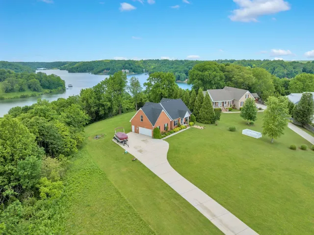 a view of a yard covered with snow in the yard