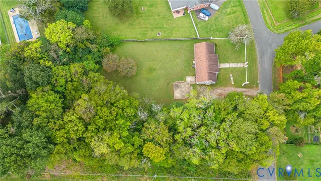 a backyard of a house with lots of green space