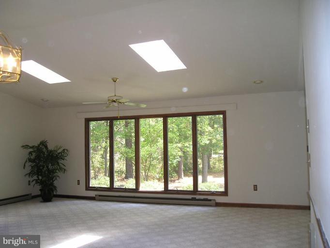 7850 Pea Neck Road St. Michaels, MD 21663 - Photo 4 of 5 a view of an empty room with a window