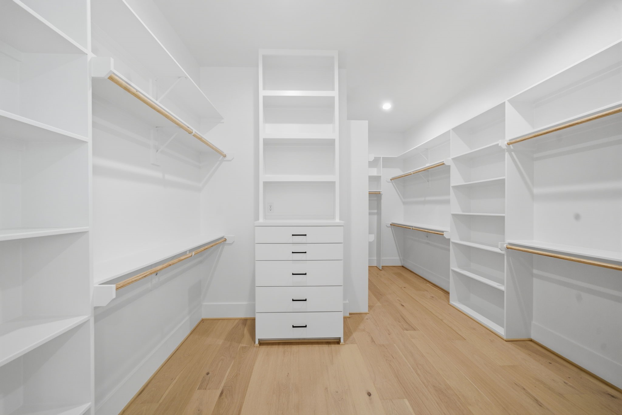 1229 Prince Street Houston, TX 77008 - Photo 23 of 32 HUGE walk-in closet with built-ins and plenty of space to keep organized. This is one of two master closets. (Photo is of a previously completed home. Finishes are subject to change.)