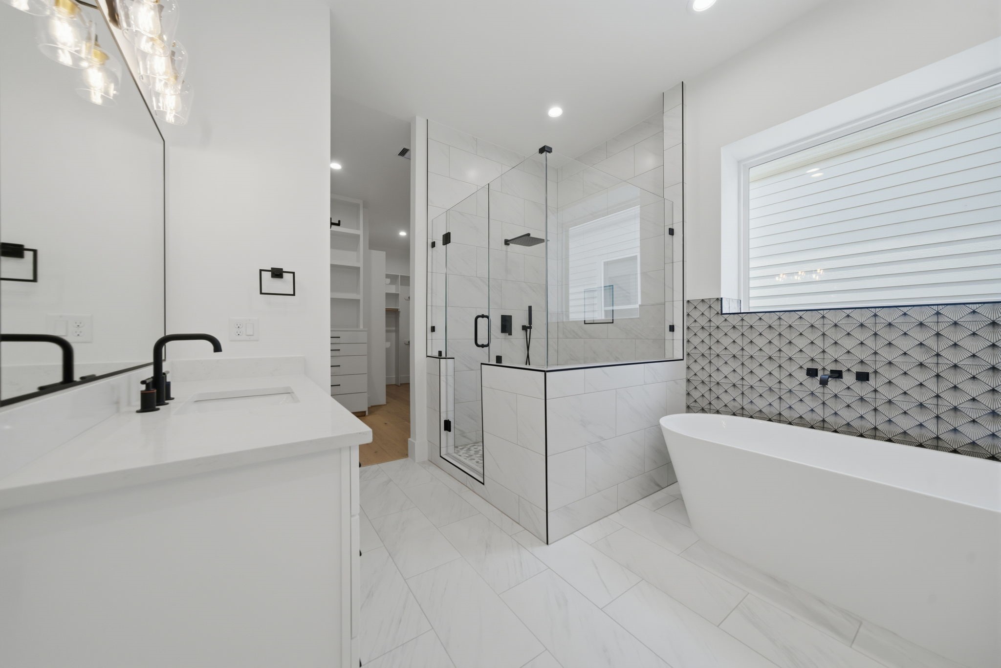 1229 Prince Street Houston, TX 77008 - Photo 25 of 32 Stylish primary bath with high-end finishes . (Photo is of a previously completed home. Finishes are subject to change.)
