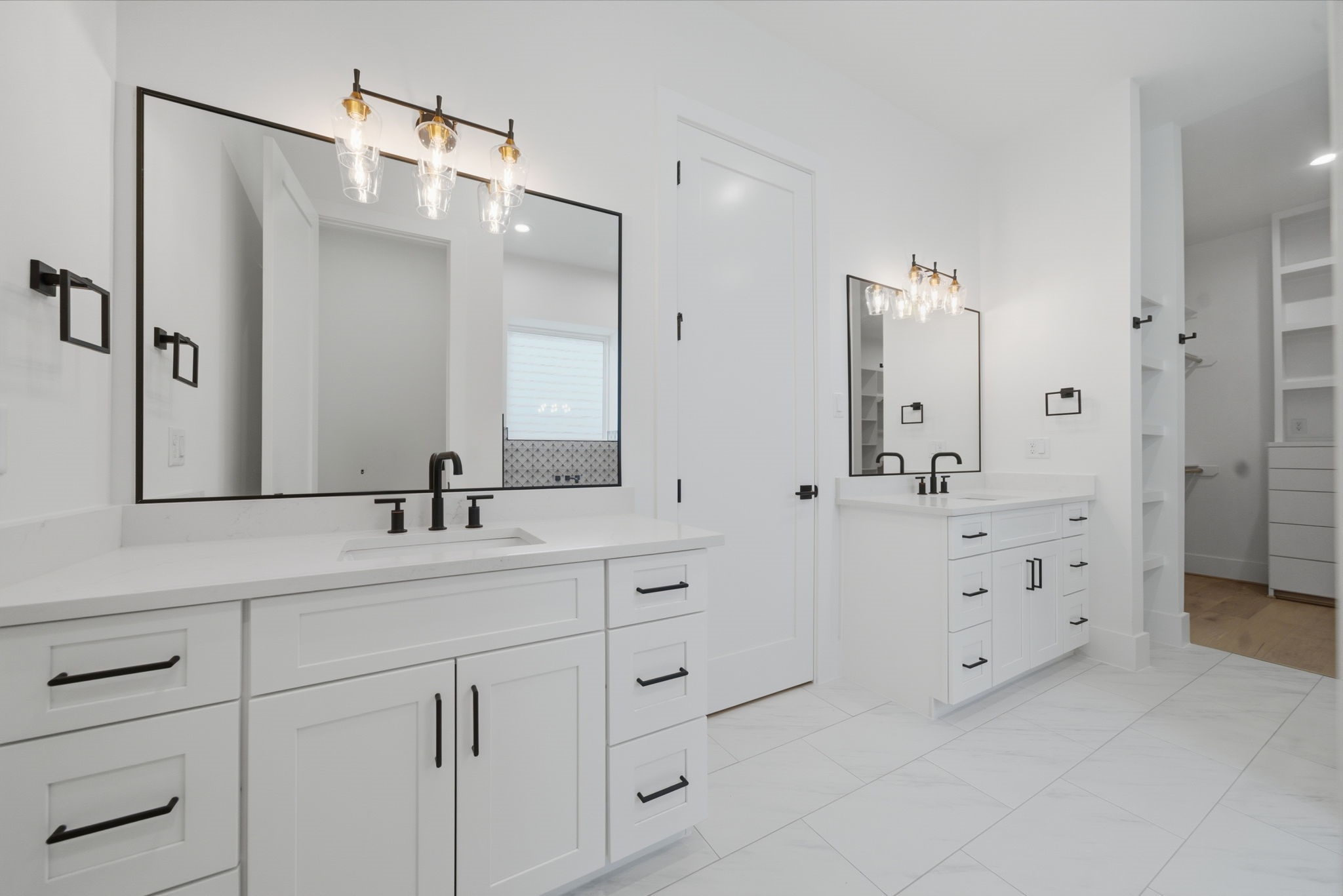 1229 Prince Street Houston, TX 77008 - Photo 26 of 32 Dual vanities with quartz counters, designer fixtures, and black matte hardware. (Photo is of a previously completed home. Finishes are subject to change.)