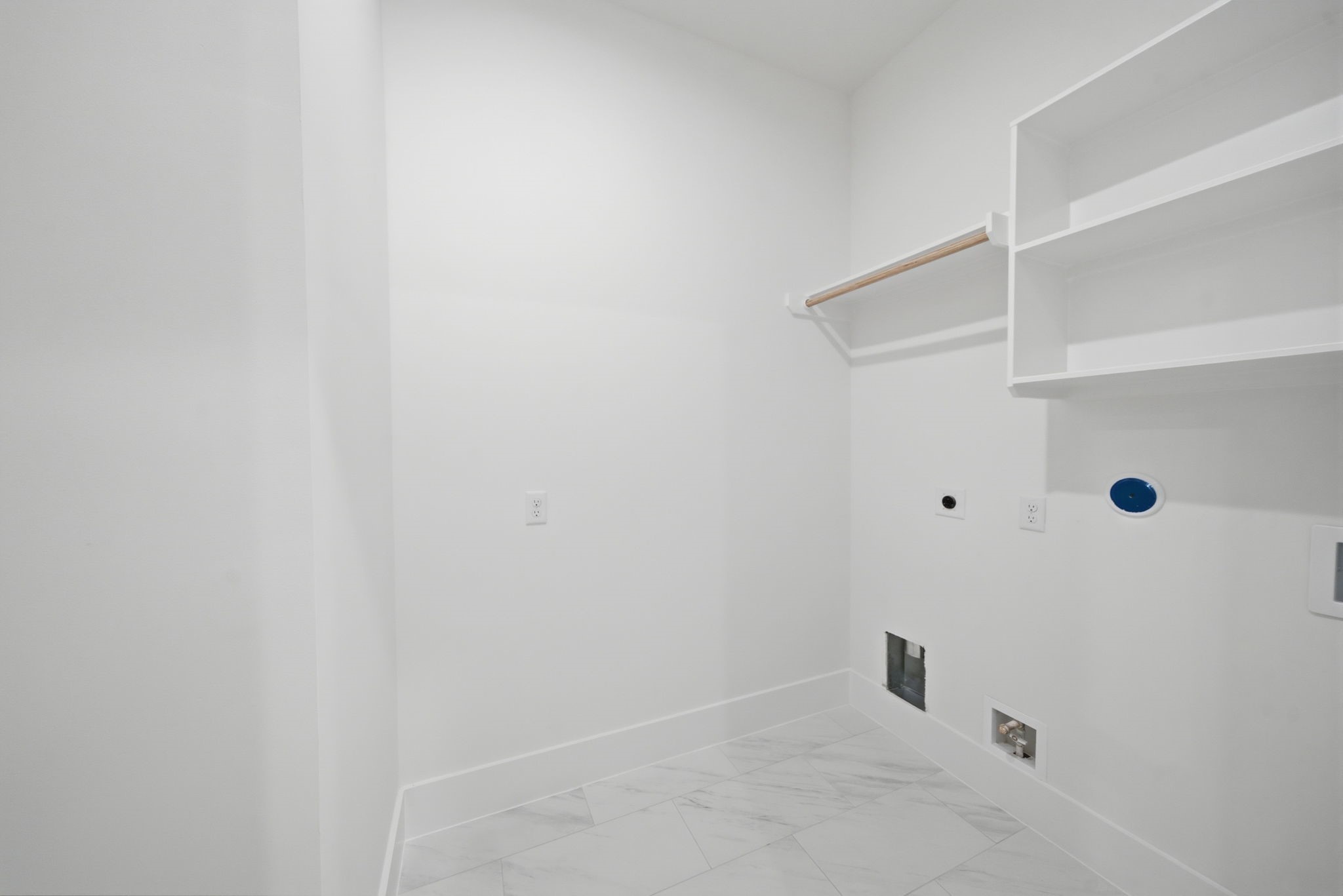 1229 Prince Street Houston, TX 77008 - Photo 31 of 32 Spacious laundry on second floor (Photo is of a previously completed home. Finishes are subject to change.)
