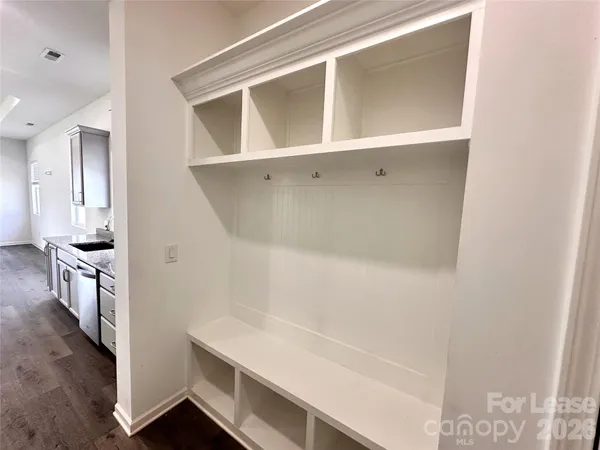 a hallway with washer and dryer