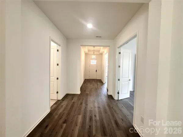 a view of wooden floor in an empty room