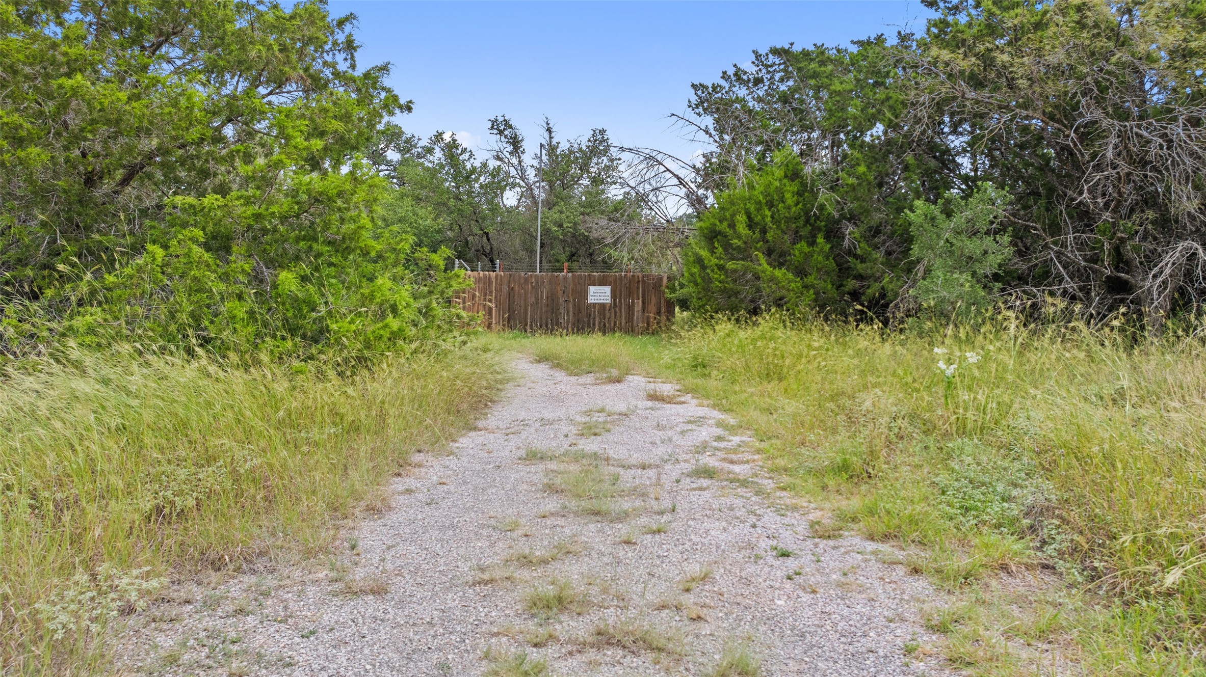 108 Cross Trail Spicewood, TX 78669 - Photo 15 of 33 Fence around Well 2, perfectly situated at the very far right of the property lines. Reference Survey