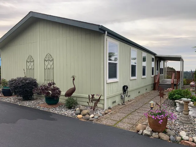 a front view of a house with patio