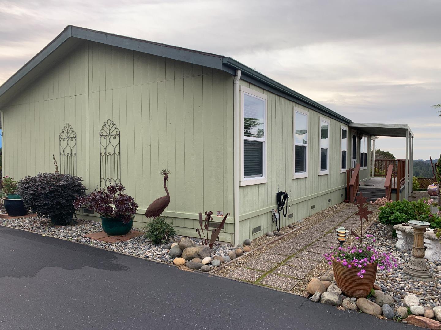 a front view of a house with patio