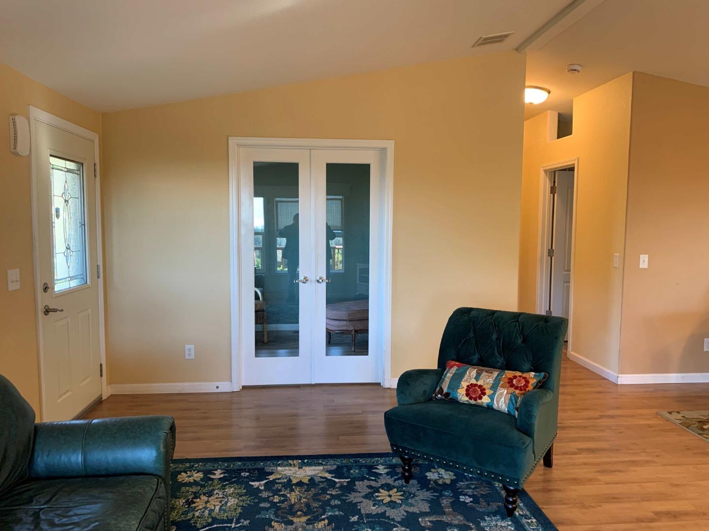 270 Hames Road, Unit 55 Watsonville, CA 95076 - Photo 19 of 53 a living room with furniture and a rug