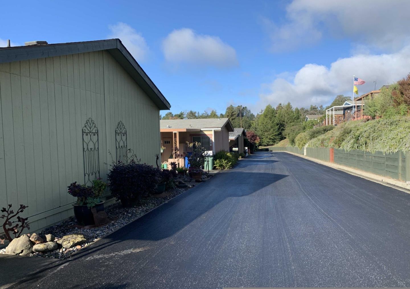 270 Hames Road, Unit 55 Watsonville, CA 95076 - Photo 2 of 53 a front view of a house with yard and outdoor seating