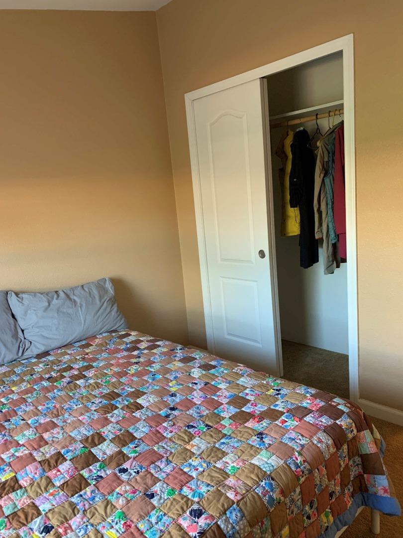 270 Hames Road, Unit 55 Watsonville, CA 95076 - Photo 24 of 53 a bedroom with a bed and a cabinets