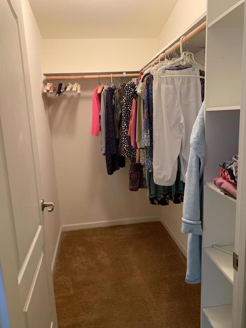 270 Hames Road, Unit 55 Watsonville, CA 95076 - Photo 29 of 53 a view of walk in closet with clothes and shoes
