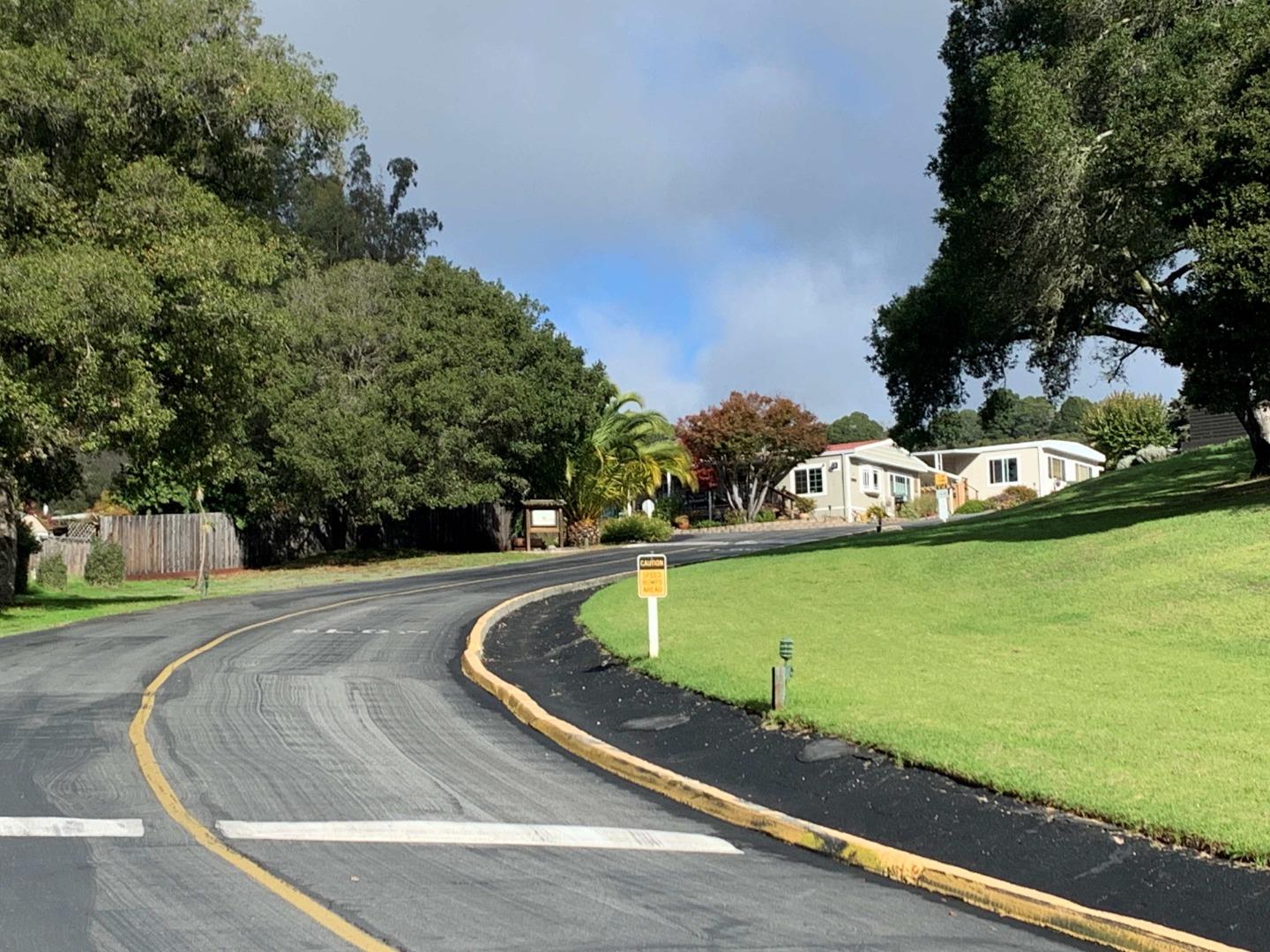 270 Hames Road, Unit 55 Watsonville, CA 95076 - Photo 35 of 53 a view of a swimming pool with a yard