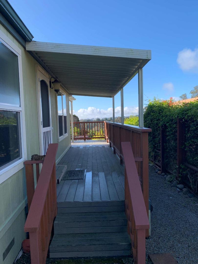 270 Hames Road, Unit 55 Watsonville, CA 95076 - Photo 8 of 53 a view of balcony with wooden floor and outdoor seating