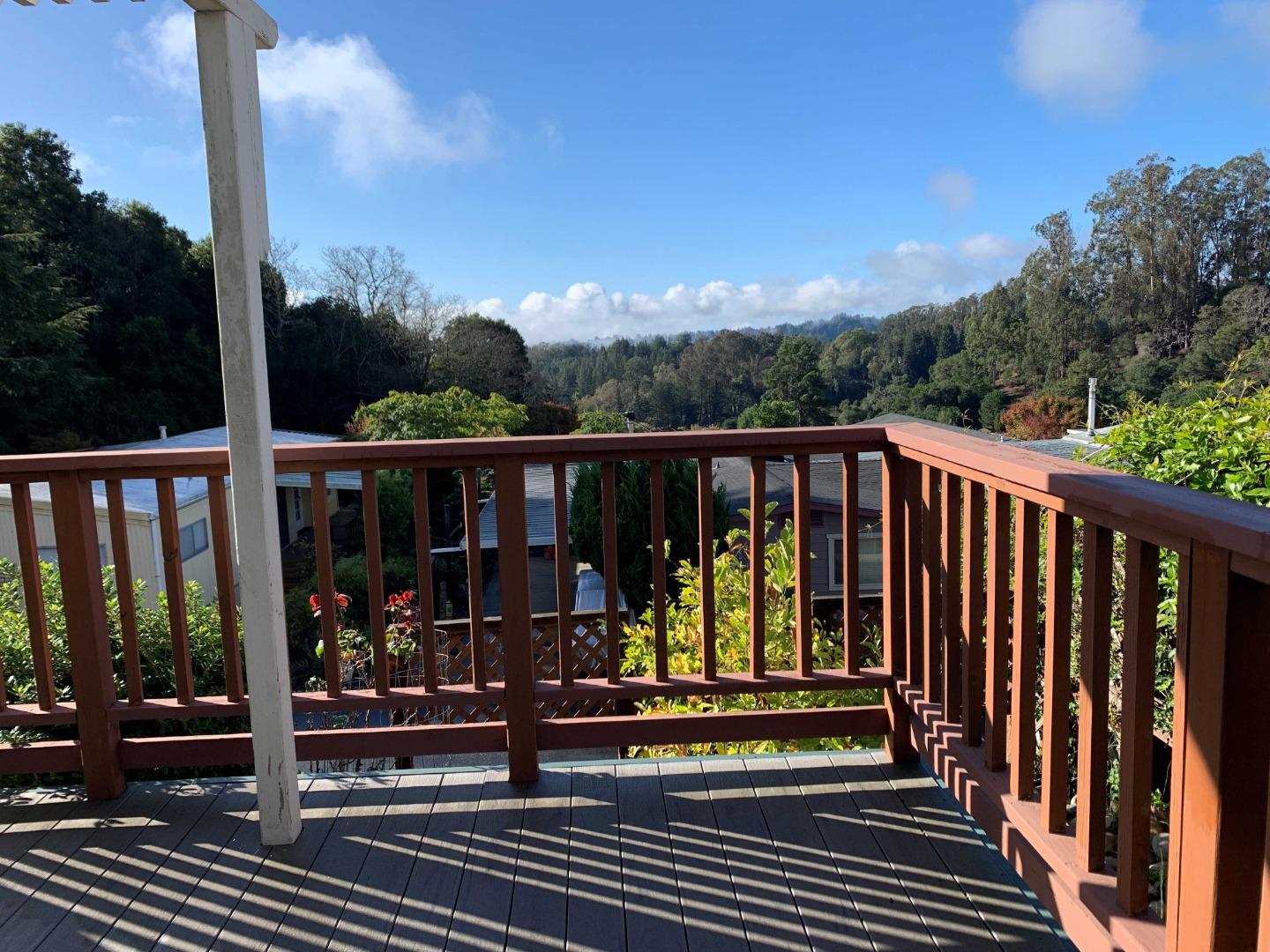 270 Hames Road, Unit 55 Watsonville, CA 95076 - Photo 10 of 53 a view of balcony with wooden floor and outdoor seating