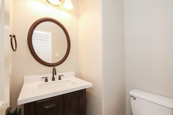 a view of storage and utility room with closet