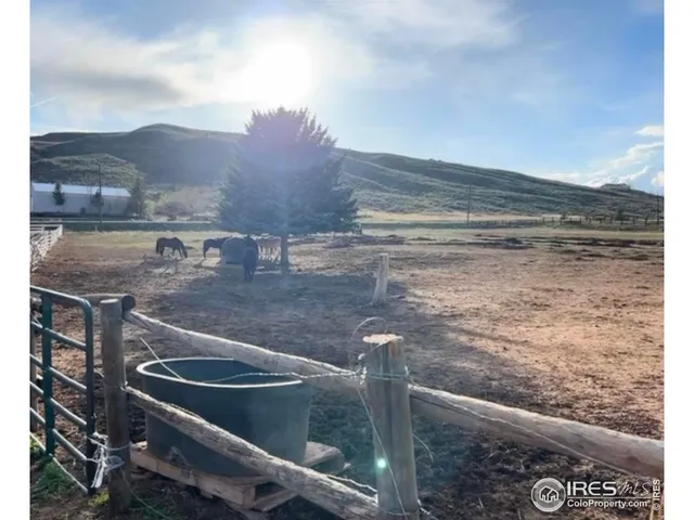 a picture of a living room with a floor to ceiling window