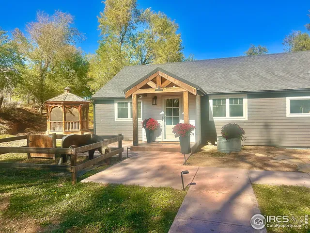 a front view of a house with a patio
