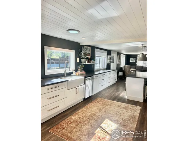 a large room with kitchen island