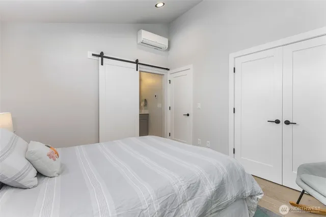 a bedroom with a bed and furniture