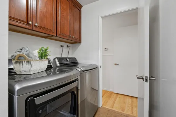 a kitchen with a stove and cabinets