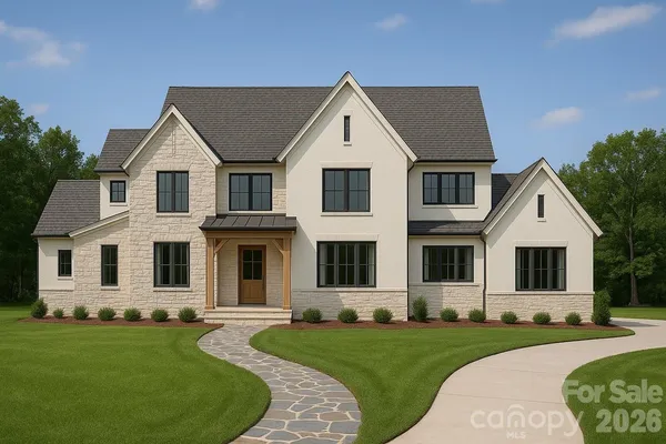 front view of a house with a yard