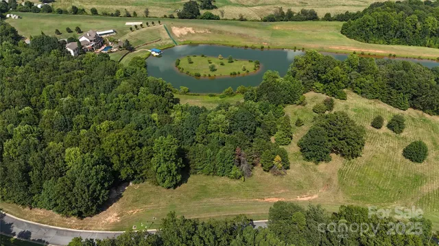 a view of a lake with a yard