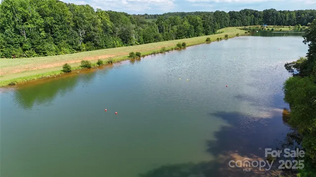 a view of a lake with a city view