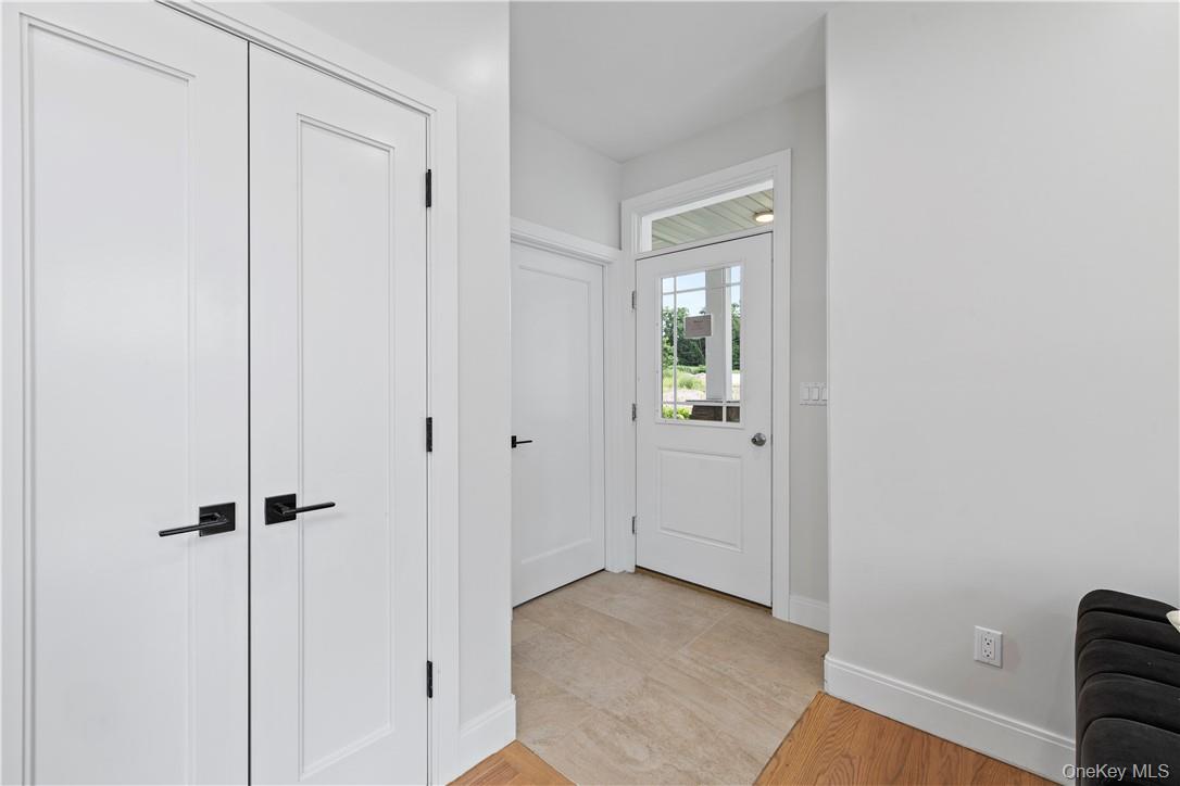 16 Dessau Circle Spring Valley, NY 10977 - Photo 11 of 32 a view of a hallway with wooden floor