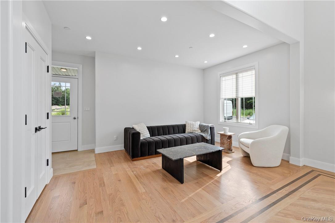 16 Dessau Circle Spring Valley, NY 10977 - Photo 12 of 32 a living room with furniture and wooden floor