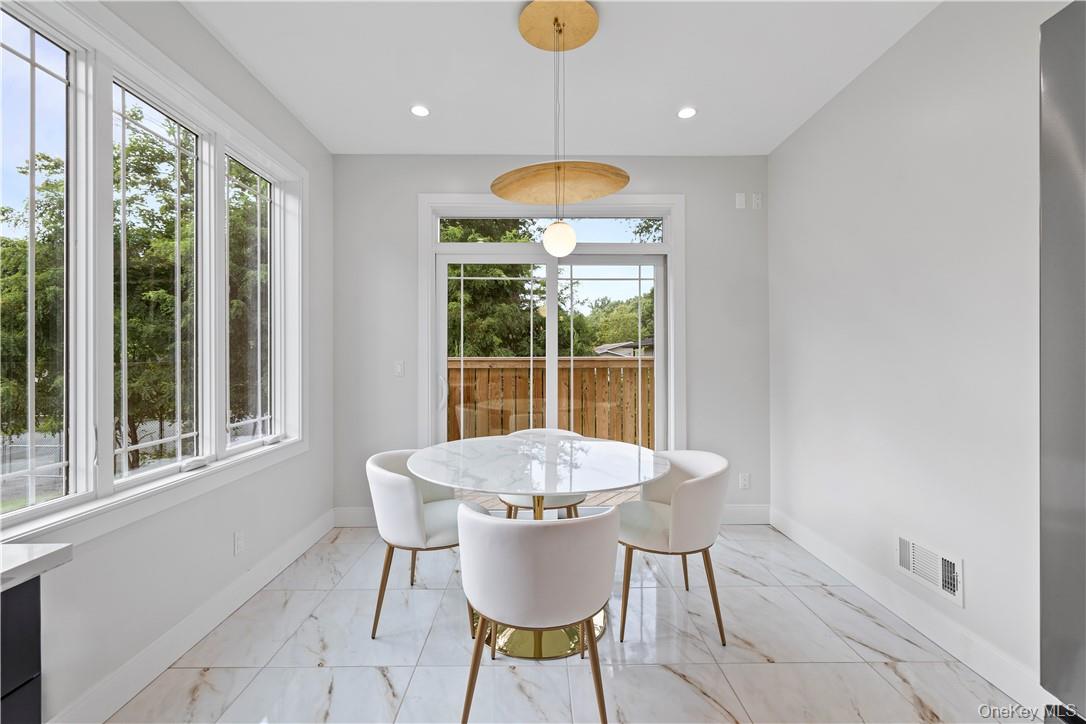 16 Dessau Circle Spring Valley, NY 10977 - Photo 16 of 32 a view of a dining room with furniture window and outside view