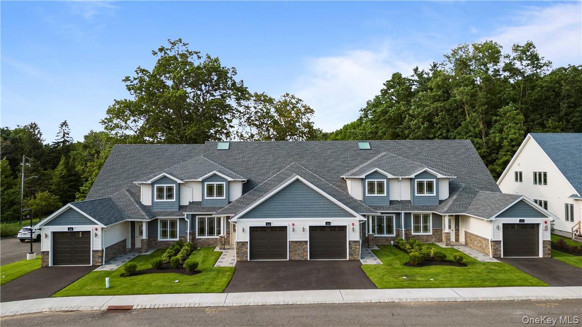 16 Dessau Circle Spring Valley, NY 10977 - Photo 3 of 32 a front view of a house with a garden