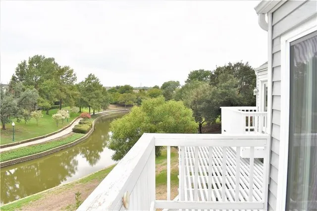 a view of a balcony with lake view