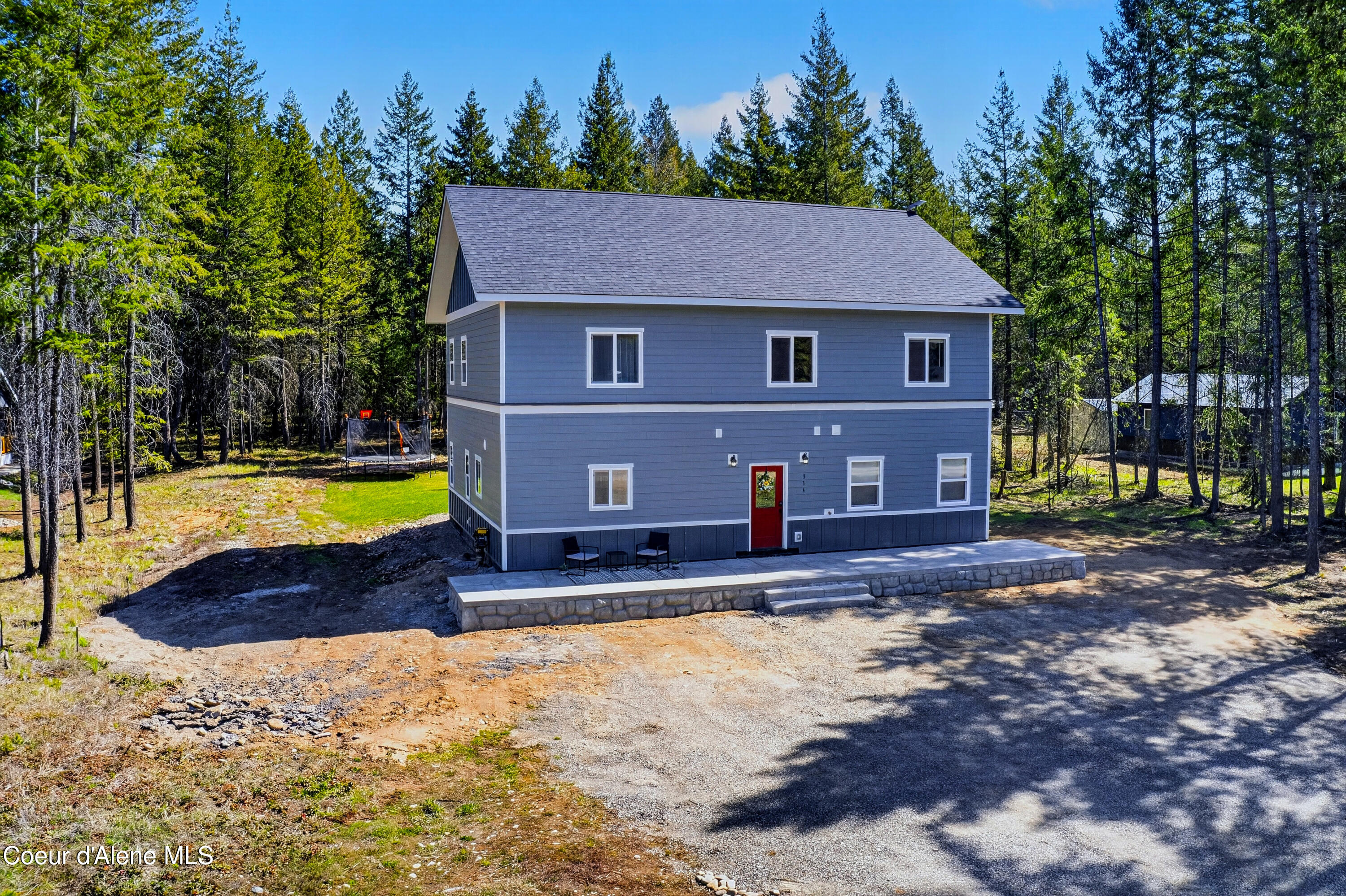 334 Hardy Loop Bonners Ferry, ID 83805 - Photo 2 of 33 001_Exterior_Front_Elevated_View