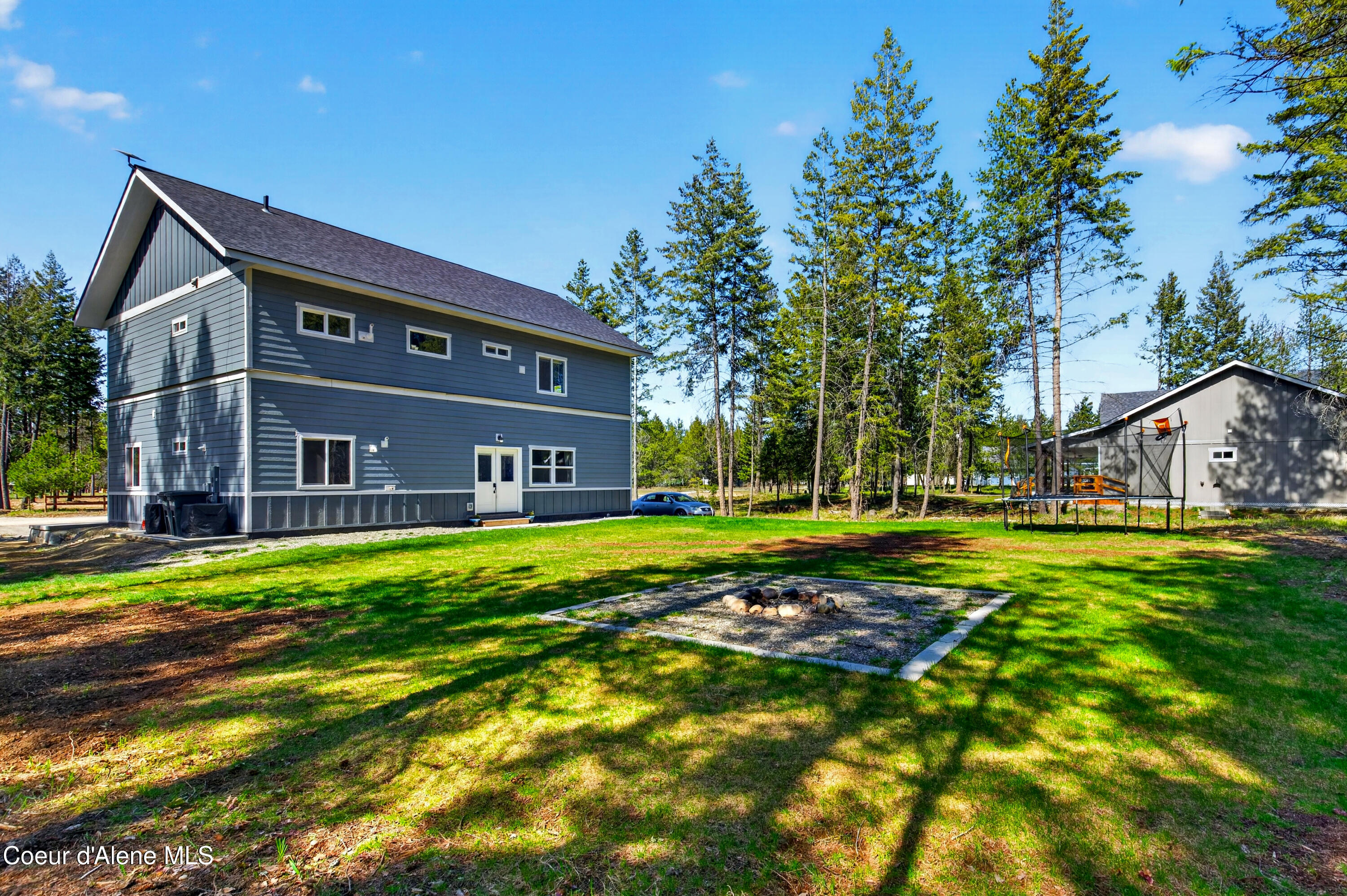 334 Hardy Loop Bonners Ferry, ID 83805 - Photo 23 of 33 022_Backyard_Patio_Concrete_Pad