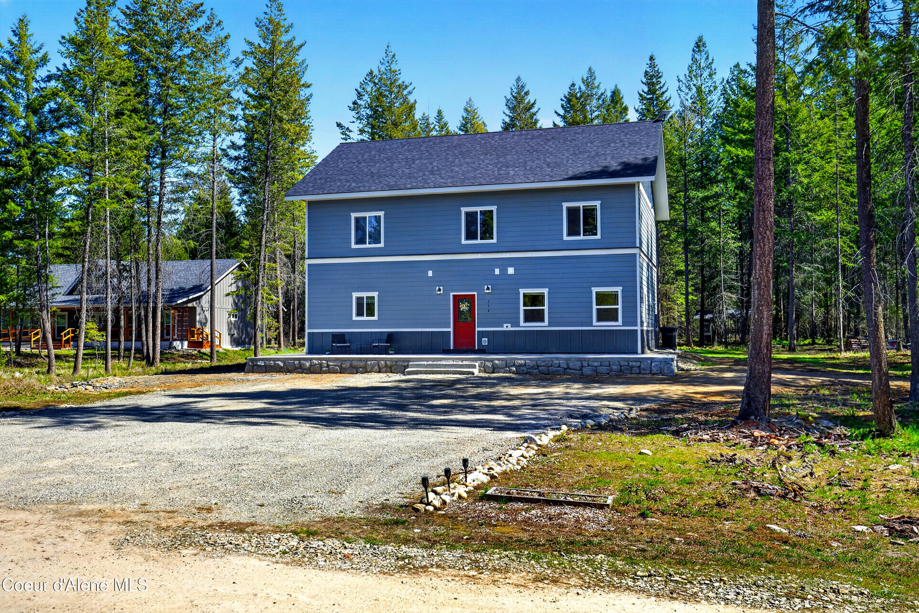 334 Hardy Loop Bonners Ferry, ID 83805 - Photo 4 of 33 003_Exterior_Front_Driveway_Angle