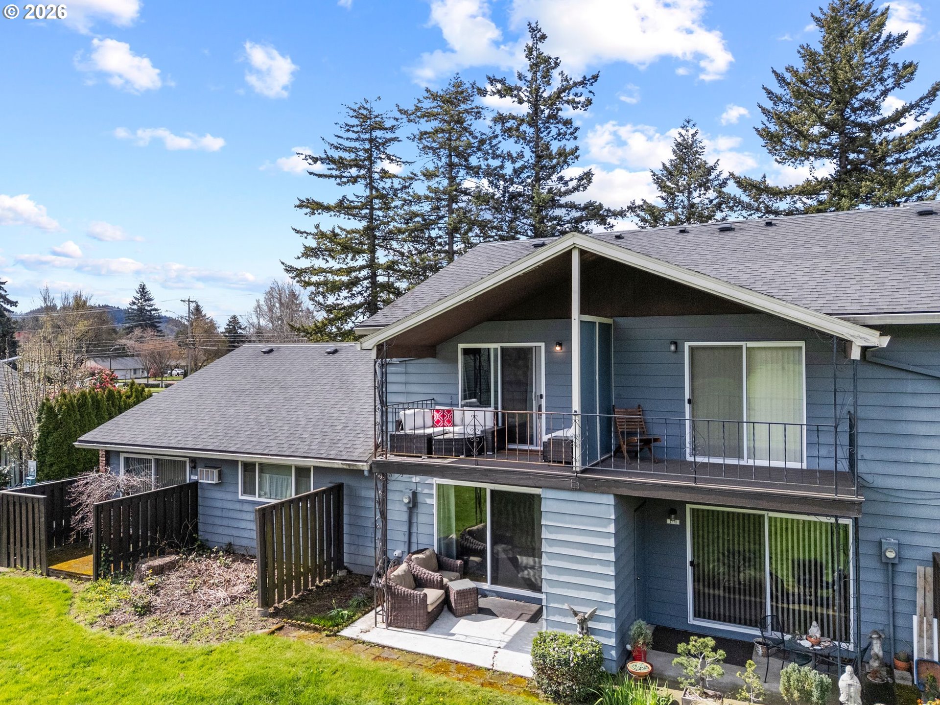 1773 Northeast 19th Street Gresham, OR 97030 - Photo 13 of 18 a view of house with backyard porch and sitting area