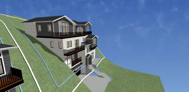 a view of a big house with wooden fence