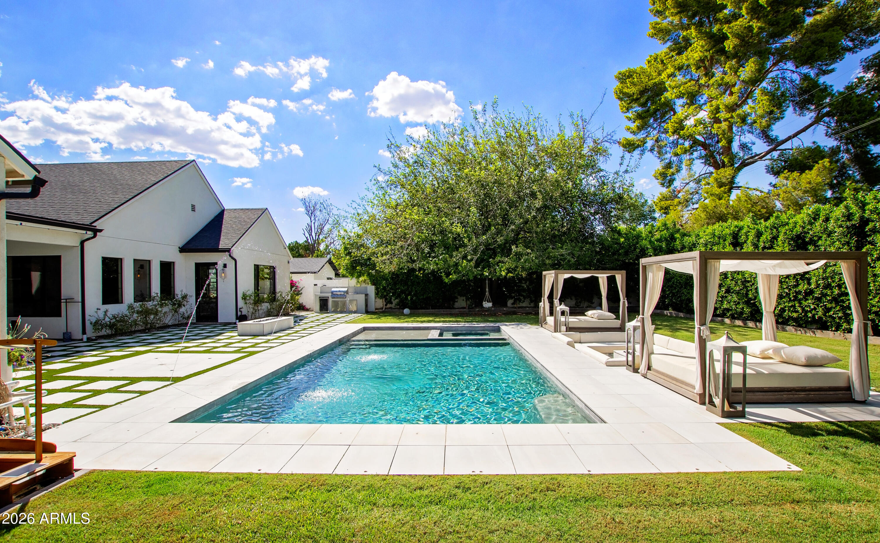 2912 East Pierson Street Phoenix, AZ 85016 - Photo 56 of 86 a view of a swimming pool with a patio