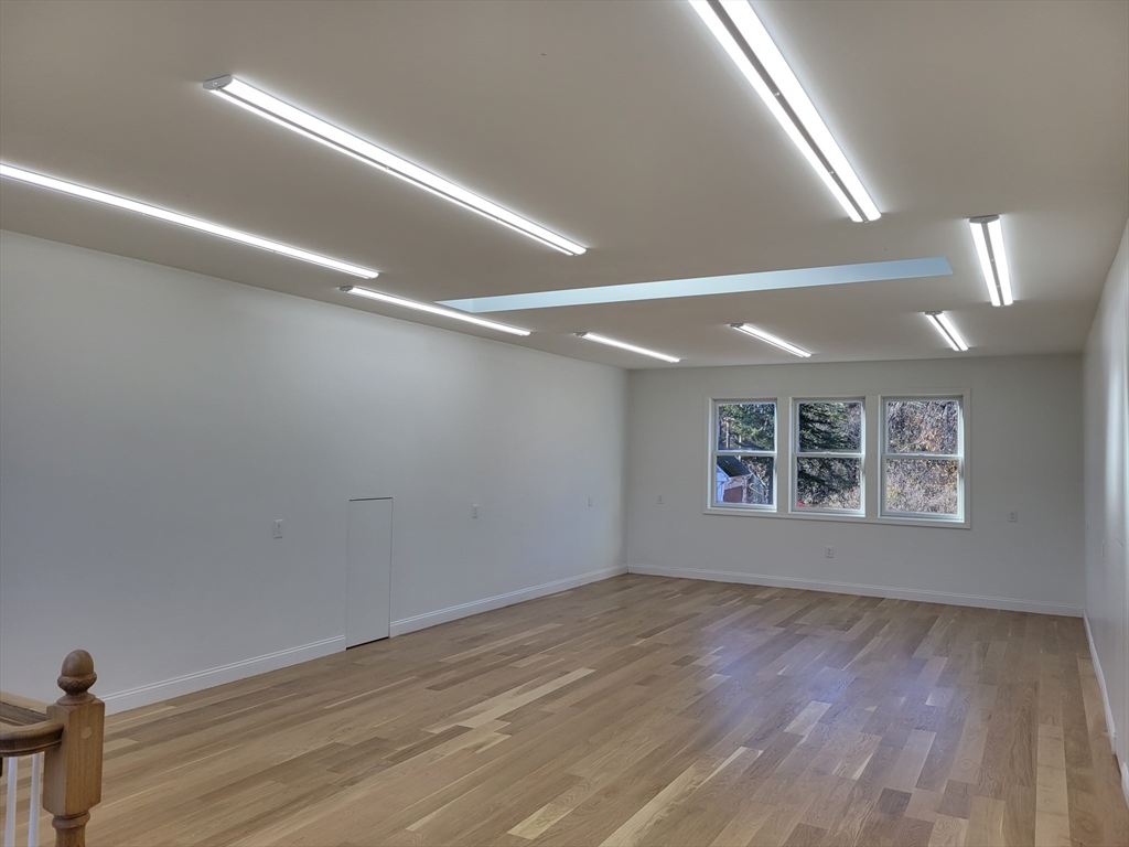 147 North Mill Street Holliston, MA 01746 - Photo 7 of 24 a view of empty room with wooden floor